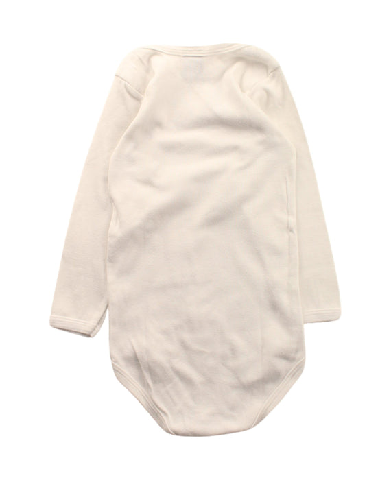 A White Long Sleeve Bodysuits from Petit Bateau in size 3T for neutral. (Back View)