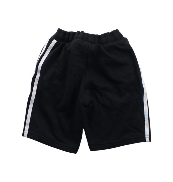 A Black Shorts from Adidas in size 6T for boy. (Back View)
