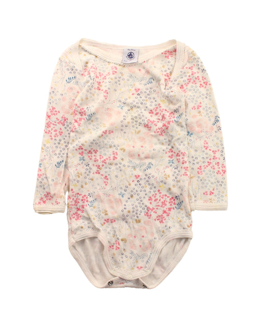 A White Long Sleeve Bodysuits from Petit Bateau in size 12-18M for girl. (Front View)