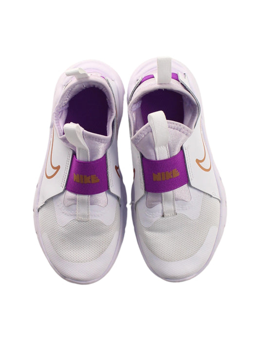 A Purple Sneakers from Nike in size 7Y for girl. (Back View)
