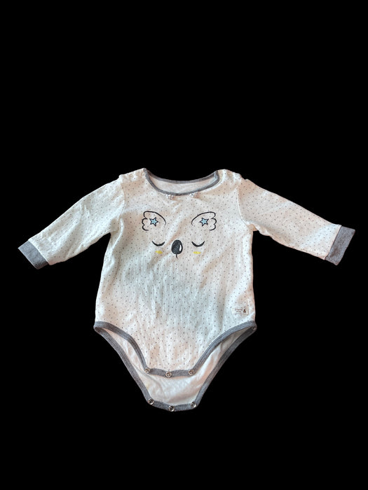 A White Long Sleeve Bodysuits from Organic Mom in size 0-3M for neutral. (Front View)