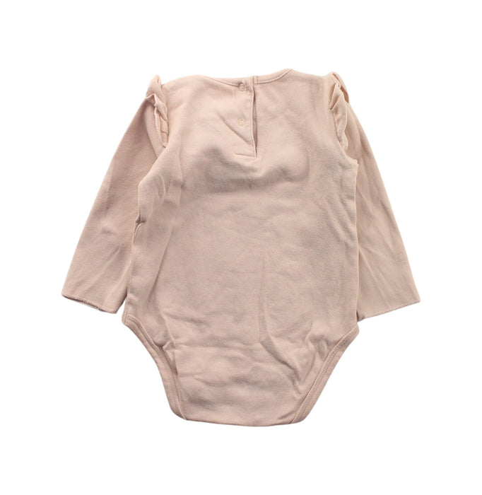 A Beige Long Sleeve Bodysuits from Play Up in size 6-12M for girl. (Back View)