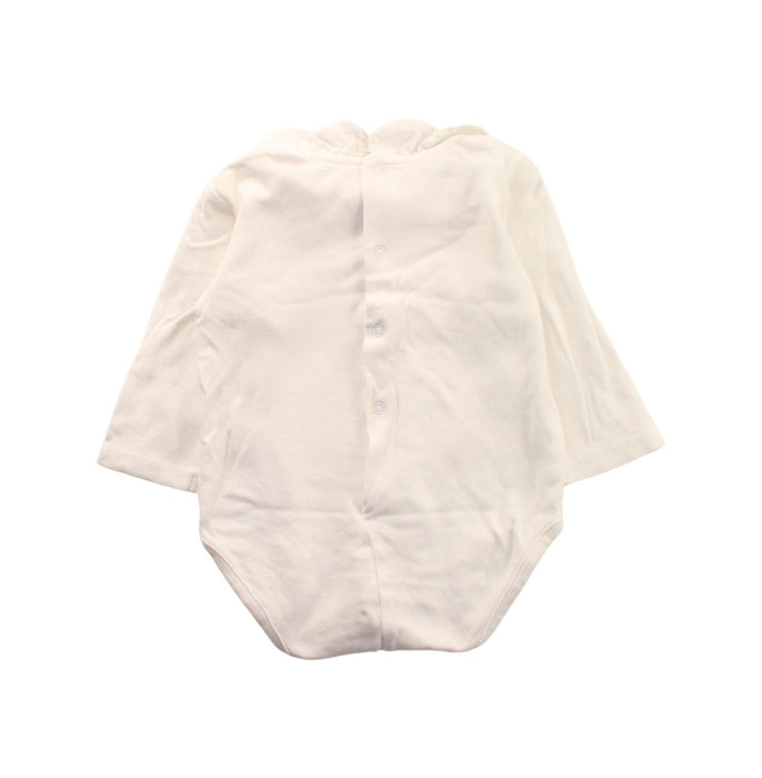 A White Long Sleeve Bodysuits from Mayoral in size 6-12M for girl. (Back View)
