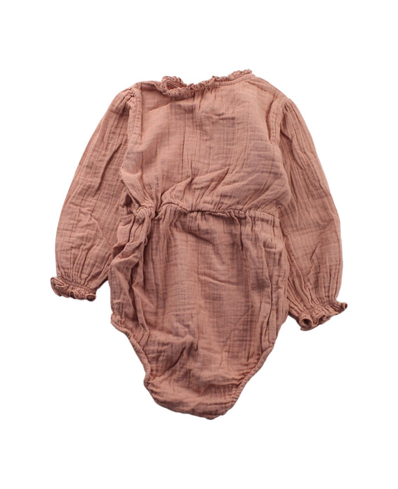 A Peach Long Sleeve Bodysuits from Marlot Paris in size 6-12M for girl. (Back View)