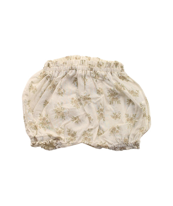 A White Bloomers from Louisiella in size 3-6M for girl. (Front View)