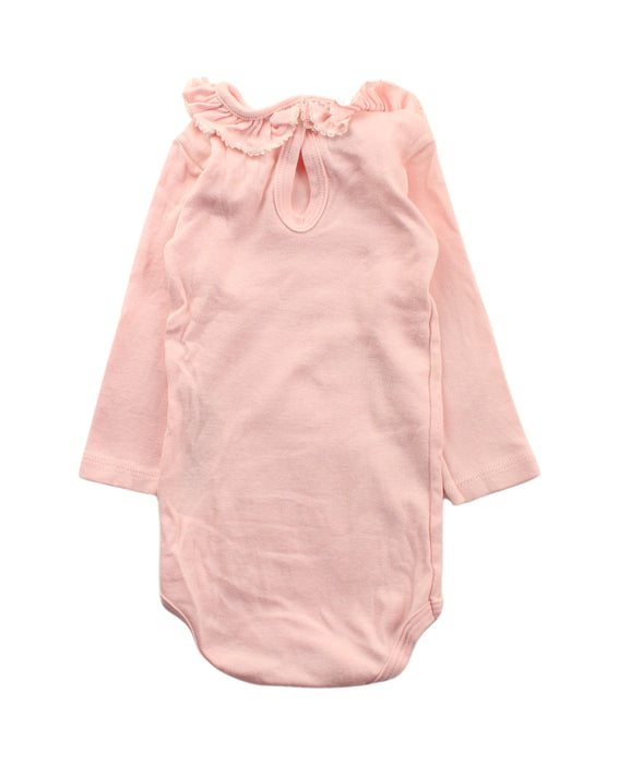 A Pink Long Sleeve Bodysuits from Petit Bateau in size 3-6M for girl. (Back View)