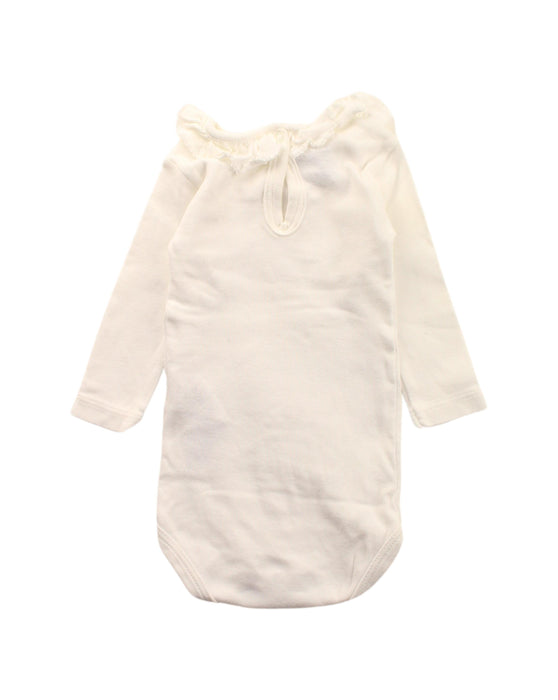 A White Long Sleeve Bodysuits from Petit Bateau in size 0-3M for girl. (Back View)