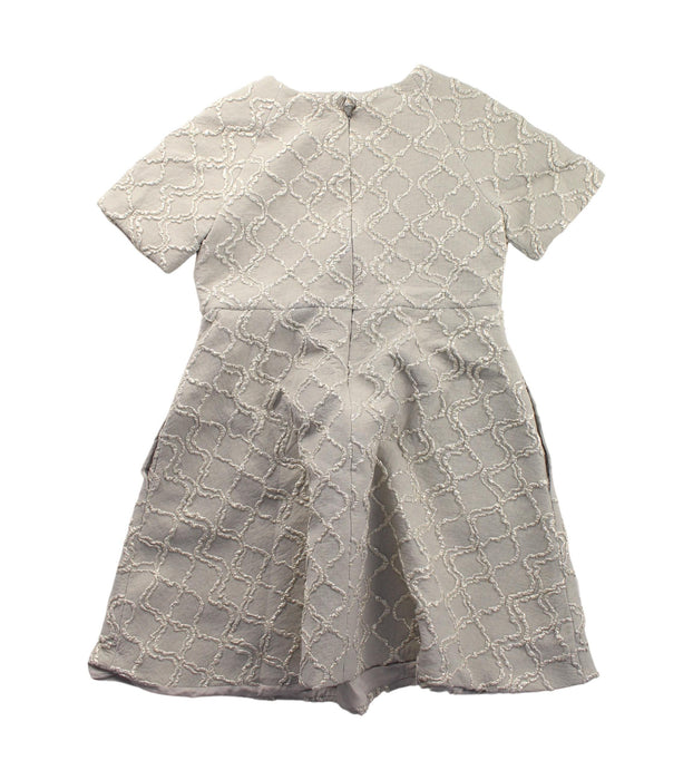 A Beige Short Sleeve Dresses from Dior in size 6T for girl. (Back View)