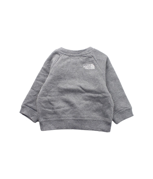 A Grey Buttoned Sweatshirts from The North Face in size 6-12M for boy. (Back View)