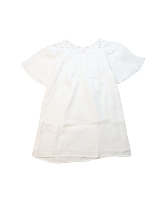 A White Short Sleeve Dresses from Chloe in size 4T for girl. (Back View)