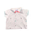 A White Short Sleeve Polos from Jacadi in size 3-6M for boy. (Front View)