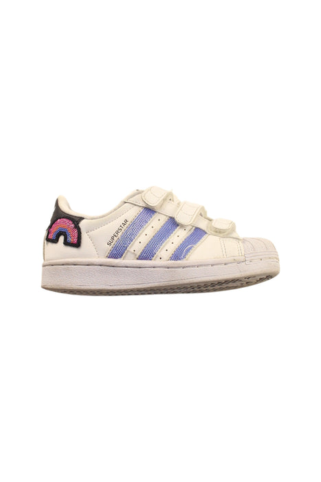 A White Sneakers from Adidas in size 5T for girl. (Front View)