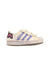A White Sneakers from Adidas in size 5T for girl. (Front View)