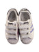 A White Sneakers from Adidas in size 5T for girl. (Back View)
