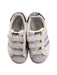 A White Sneakers from Adidas in size 5T for girl. (Back View)