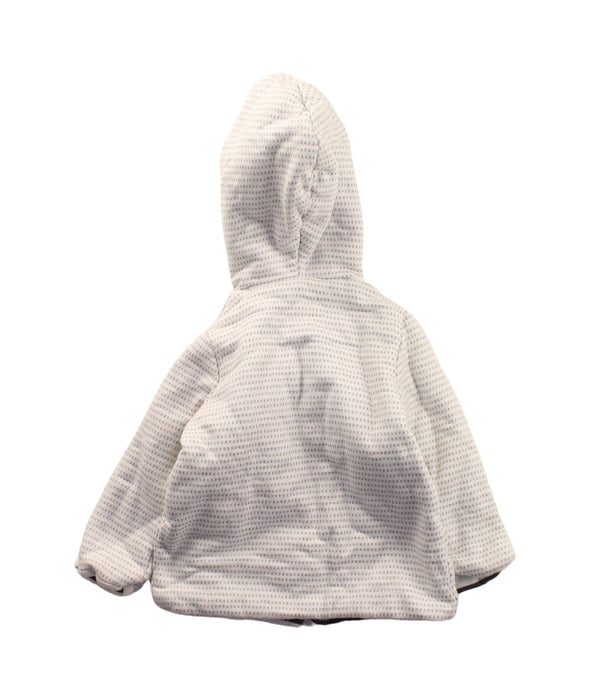 A White Cardigans from Mamas & Papas in size 6-12M for girl. (Back View)