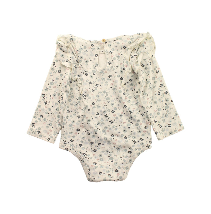 A White Long Sleeve Bodysuits from Pehr in size 12-18M for girl. (Back View)