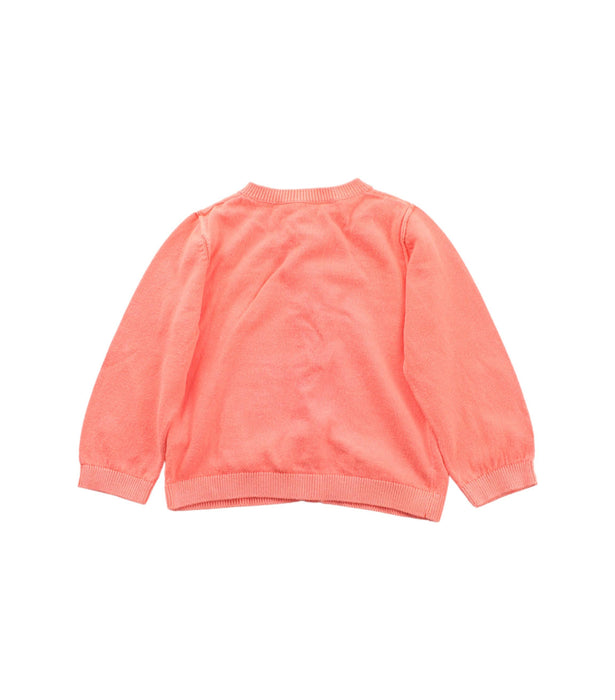 A Peach Cardigans from Bonpoint in size 6-12M for girl. (Back View)