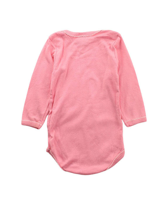 A Pink Long Sleeve Bodysuits from Petit Bateau in size 6-12M for girl. (Back View)