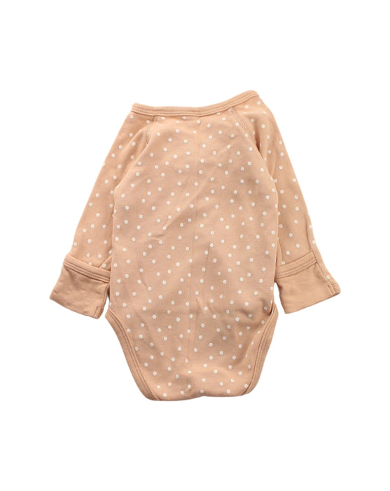 A Beige Long Sleeve Bodysuits from Quincy Mae in size 0-3M for neutral. (Back View)