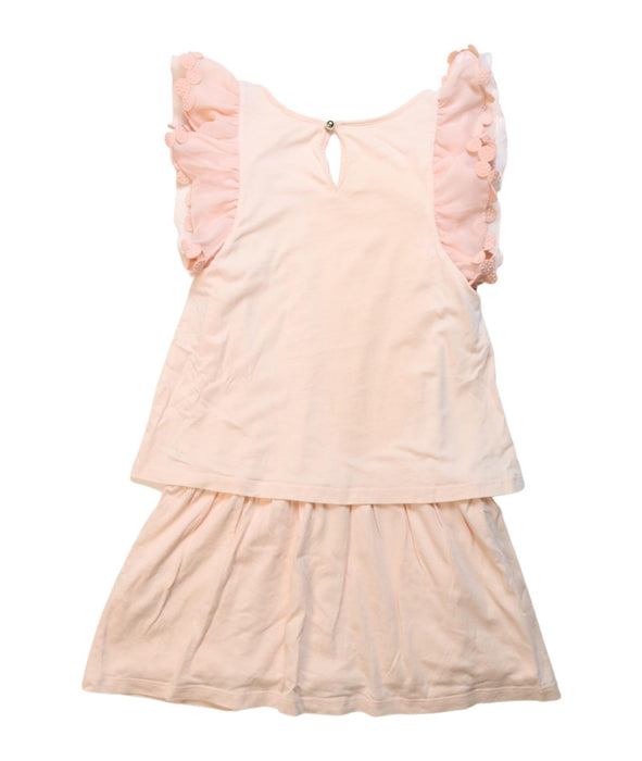 A Peach Short Sleeve Dresses from Chloe in size 8Y for girl. (Back View)