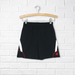 A Black Shorts from CDNIS in size 4T for neutral. (Front View)