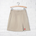 A Beige Skorts from CDNIS in size 4T for girl. (Front View)
