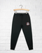 A Black Sweatpants from CDNIS in size 4T for neutral. (Front View)