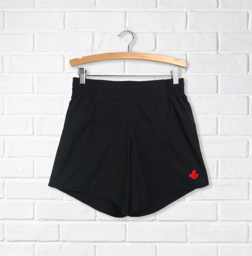 A Black Shorts from CDNIS in size 4T for girl. (Front View)