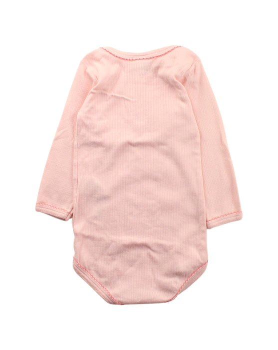A Pink Long Sleeve Bodysuits from Petit Bateau in size 6-12M for girl. (Back View)