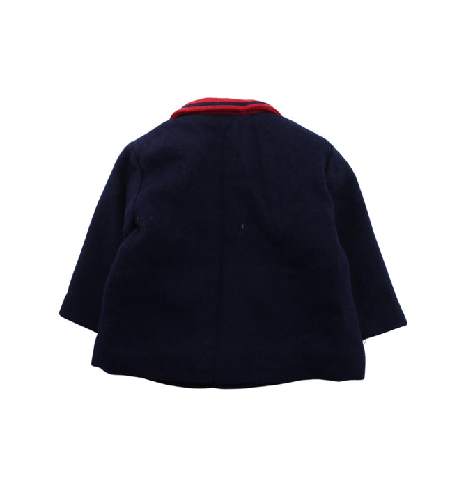 A Blue Coats from Rachel Riley in size 6-12M for boy. (Back View)
