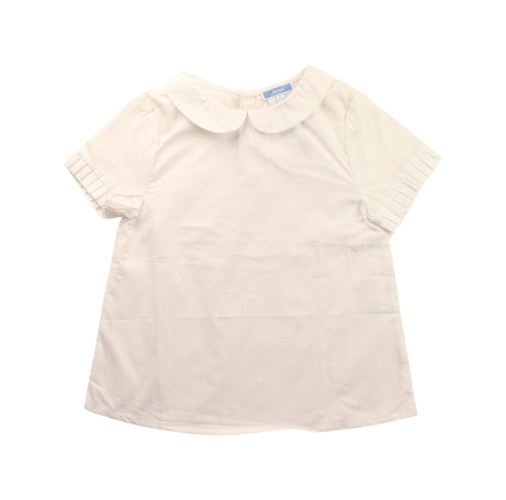 A White Short Sleeve Dresses from Jacadi in size 5T for girl. (Front View)