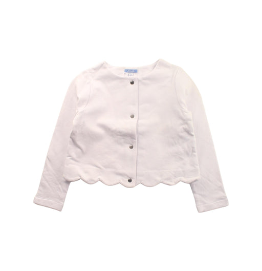 A White Cardigans from Jacadi in size 6T for girl. (Front View)