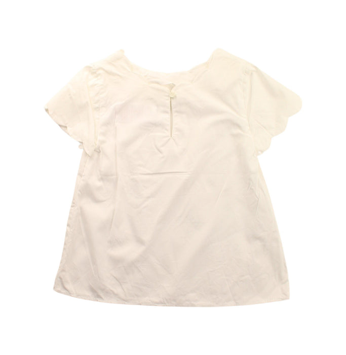 A White Short Sleeve Dresses from Jacadi in size 4T for girl. (Back View)