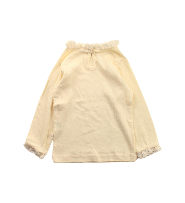 A Ivory Knit Sweaters from Aosta in size 12-18M for girl. (Back View)