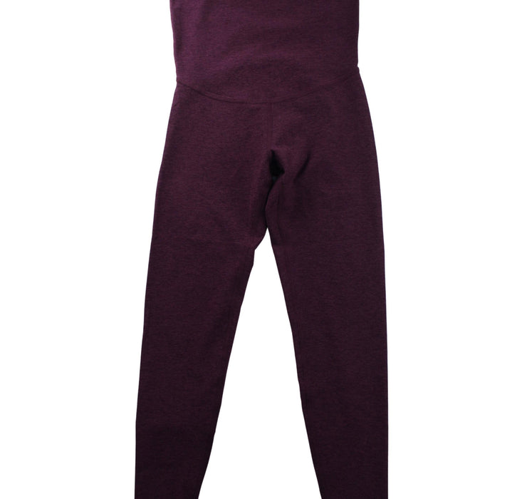 A Burgundy Leggings from Beyond Yoga in size XS for maternity. (Front View)