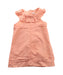 A Peach Sleeveless Dresses from Chloe in size 6-12M for girl. (Front View)