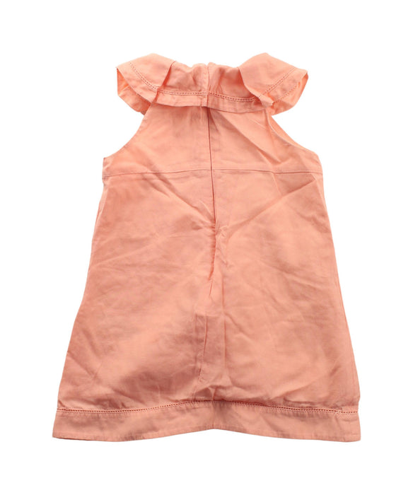 A Peach Sleeveless Dresses from Chloe in size 6-12M for girl. (Back View)