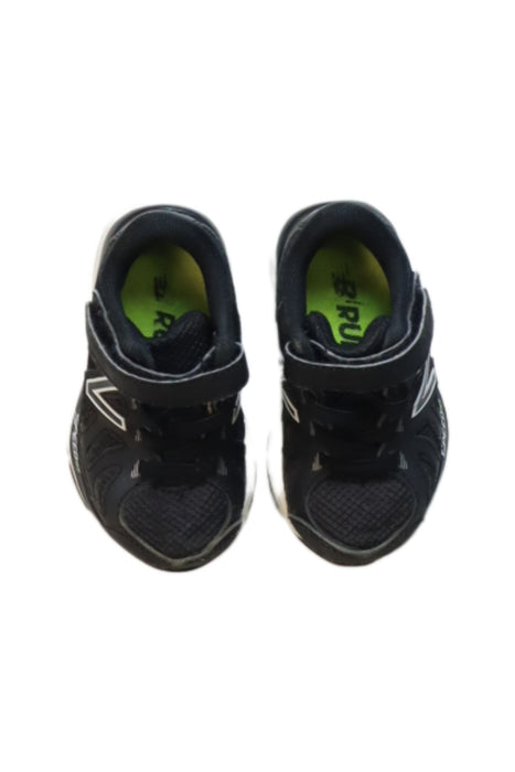 A Black Sneakers from New Balance in size 12-18M for boy. (Back View)