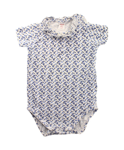 A Blue Short Sleeve Bodysuits from Seed in size 12-18M for girl. (Front View)