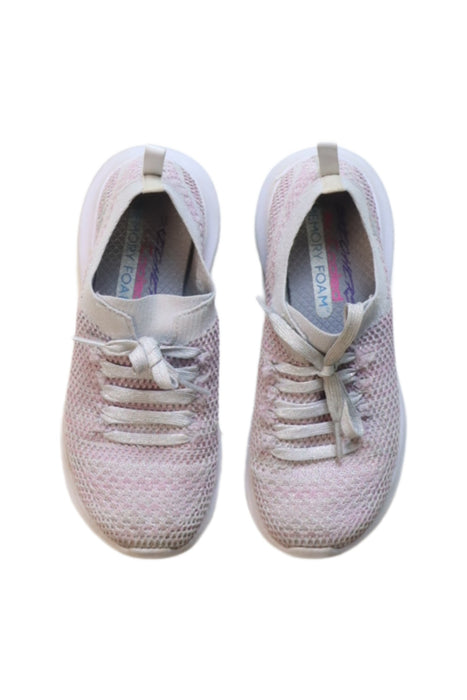 A Pink Sneakers from Skechers in size 7Y for girl. (Back View)