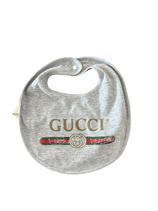 A Grey Bibs from Gucci in size 0-3M for neutral. (Front View)