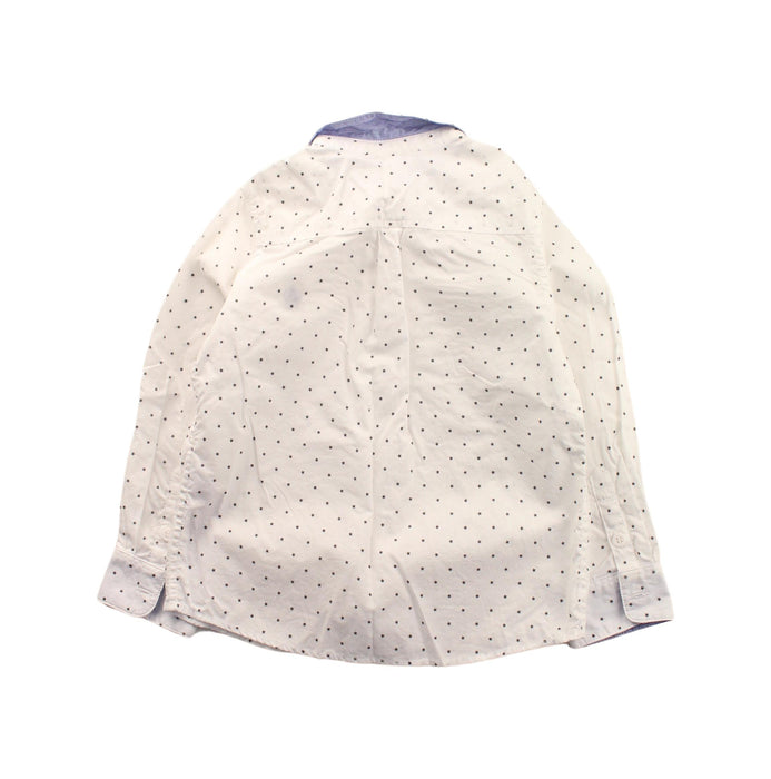 A Black Long Sleeve Shirts from Petit Bateau in size 4T for boy. (Back View)