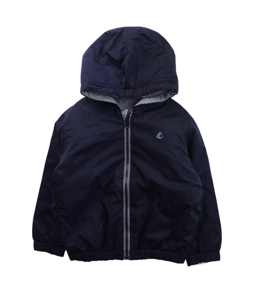 A Blue Puffer/Quilted Jackets from Petit Bateau in size 4T for boy. (Front View)