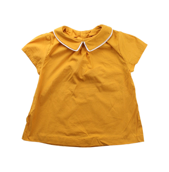 A Yellow Short Sleeve Dresses from Jacadi in size 5T for girl. (Front View)