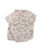 A White Short Sleeve Shirts from DPAM in size 3-6M for boy. (Front View)
