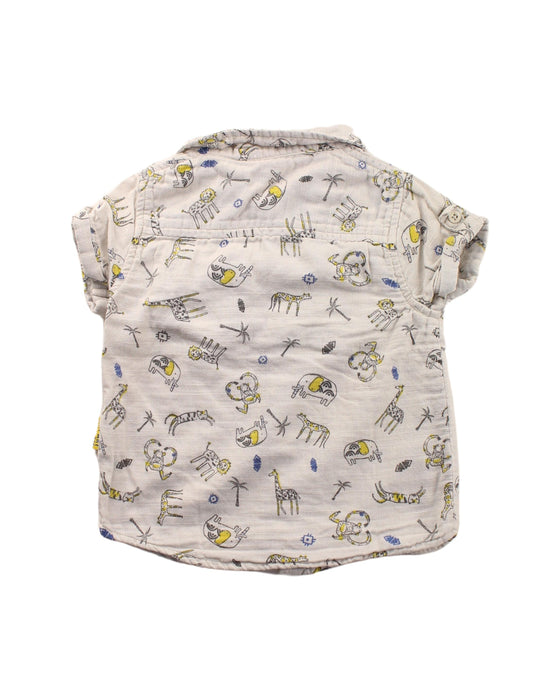 A White Short Sleeve Shirts from DPAM in size 3-6M for boy. (Back View)