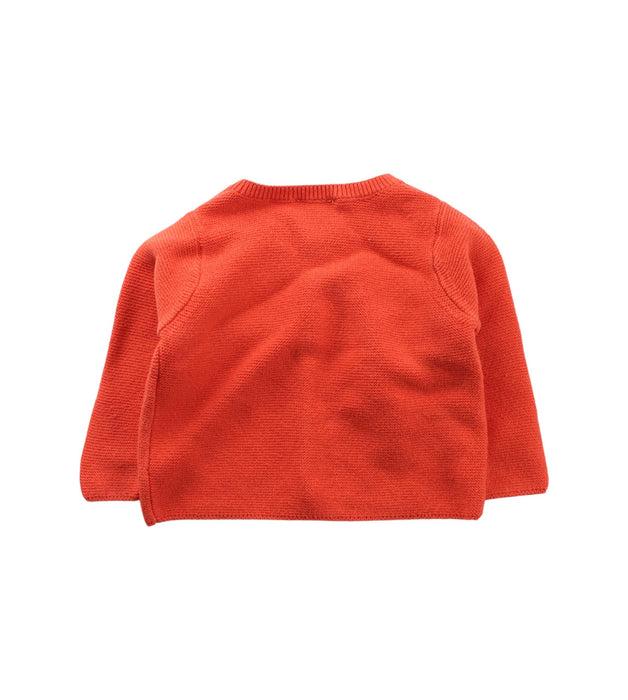 A Orange Cardigans from Jacadi in size 3-6M for girl. (Back View)