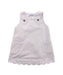 A White Overall Dresses from Jacadi in size 3-6M for girl. (Front View)