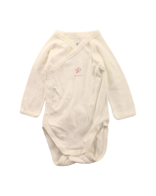 A White Long Sleeve Bodysuits from Petit Bateau in size 0-3M for girl. (Front View)